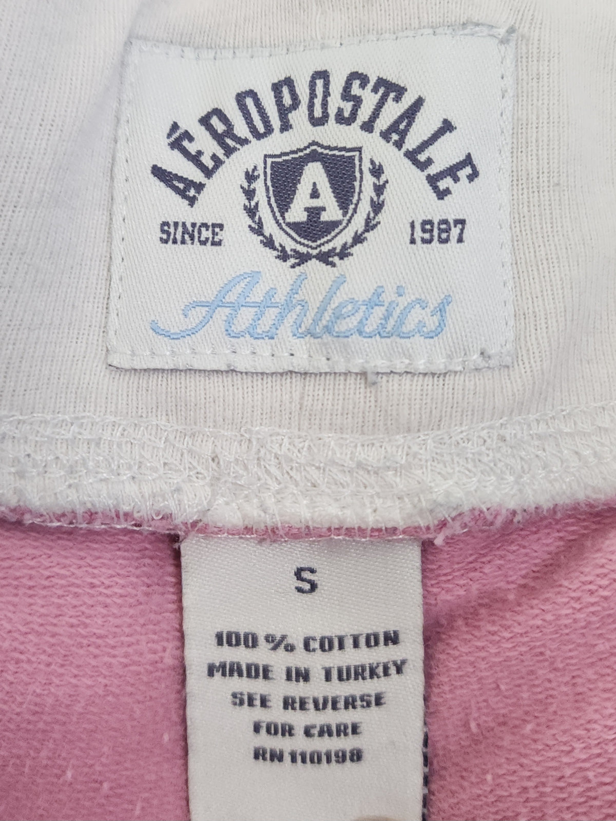 Y2K Aéropostale Baby Pink Graphic Print Mini Skirt with Built-In Shorts